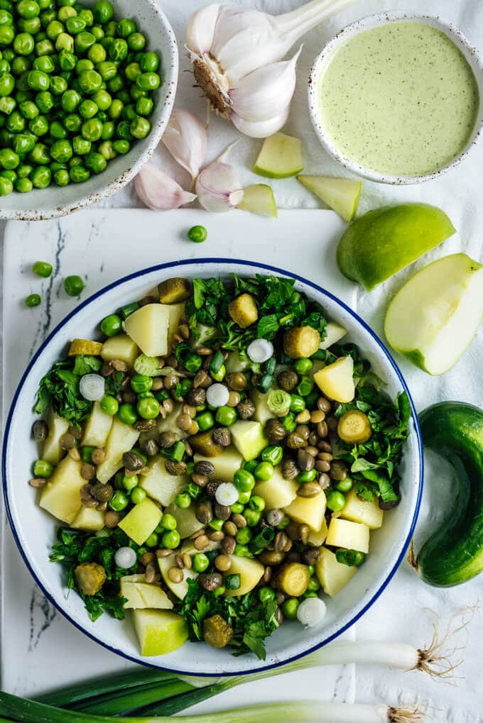 Vegan Potato Salad with green lentils and a refreshing creamy tahini dressing is packed with flavors and nutrients. It takes your dinner parties or pot lucks to the next level.