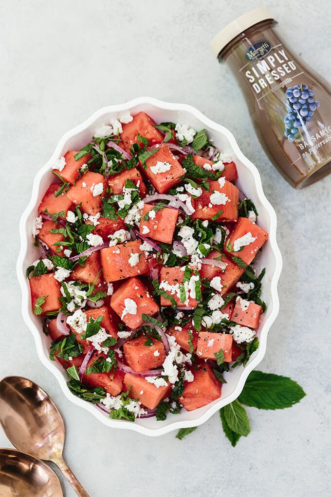 Watermelon Feta Mint Salad with red onion is a super refreshing summertime recipe. The simple balsamic dressing in this unexpected combination of flavors takes the salad to the next level. #ad #WFDRecipes