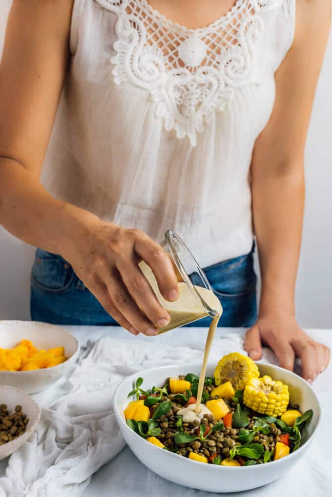 Cold Lentil Salad with Peaches is a refreshing and nutrition-packed summer meal. Tangy tahini dressing makes all the difference.