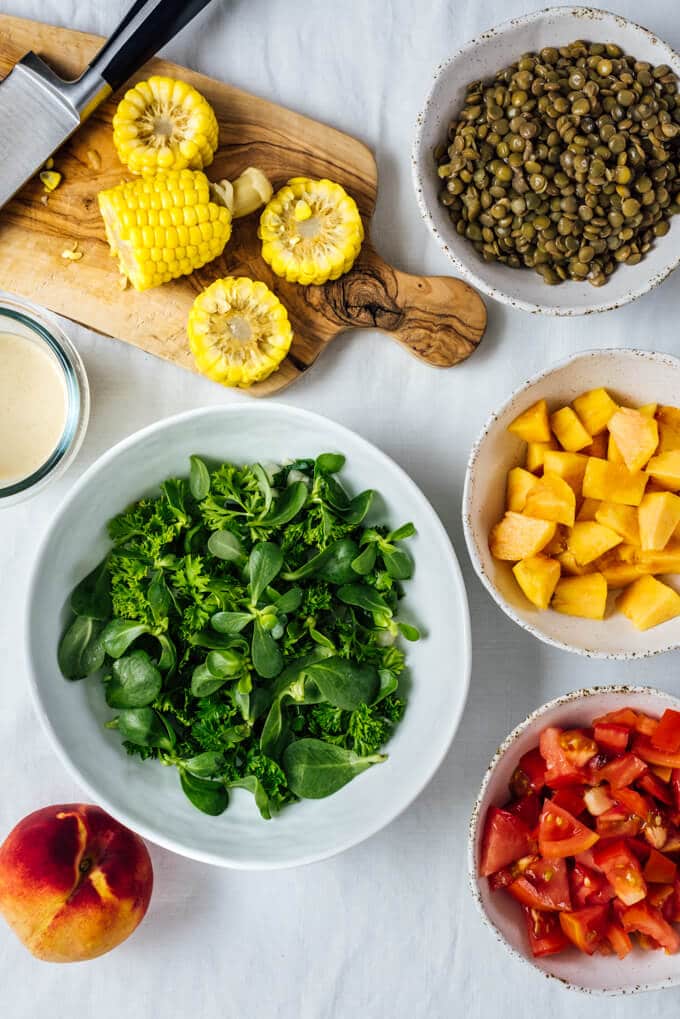 Cold Lentil Salad with Peaches is a refreshing and nutrition-packed summer meal. Tangy tahini dressing makes all the difference.