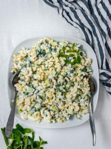 This Pasta Salad without Mayo is creamy and refreshing thanks to Greek yogurt and cucumber. It makes a perfect and satisfying summer lunch that is ready within minutes.