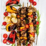 This Lamb Shish Kabob Recipe is a big hit on special occasions. The kabob is tender and juicy thanks to an easy yogurt marinade. Fancy yet simple and easy! Perfect for weeknight dinners too!  