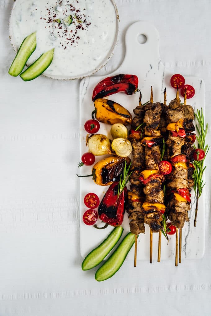 This Lamb Shish Kabob Recipe is a big hit on special occasions. The kabob is tender and juicy thanks to an easy yogurt marinade. Fancy yet simple and easy! Perfect for weeknight dinners too!  