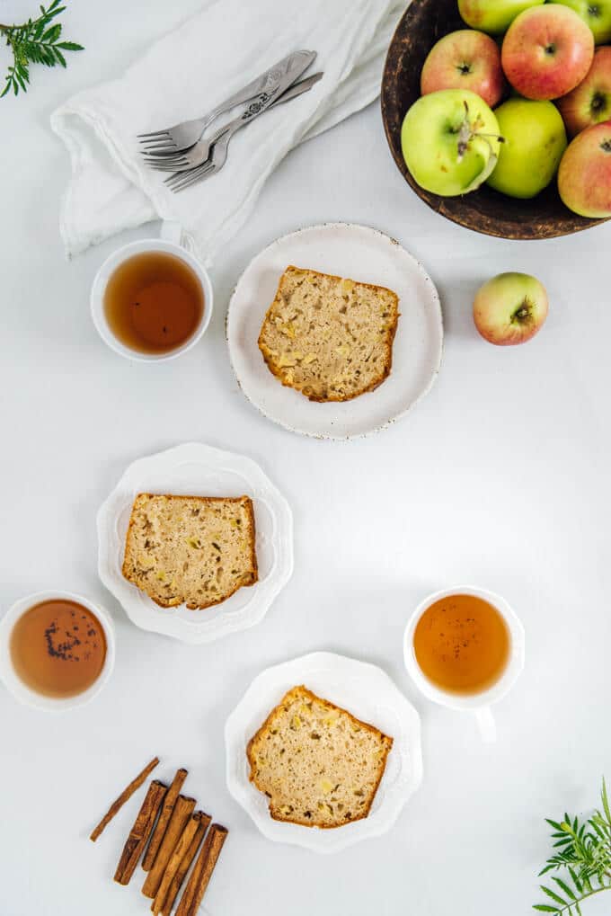 Apple Cinnamon Bread is a not-too-sweet bread that is loaded with apple chunks and flavored with fall spices. Our house smells mesmerizing when it’s baking.