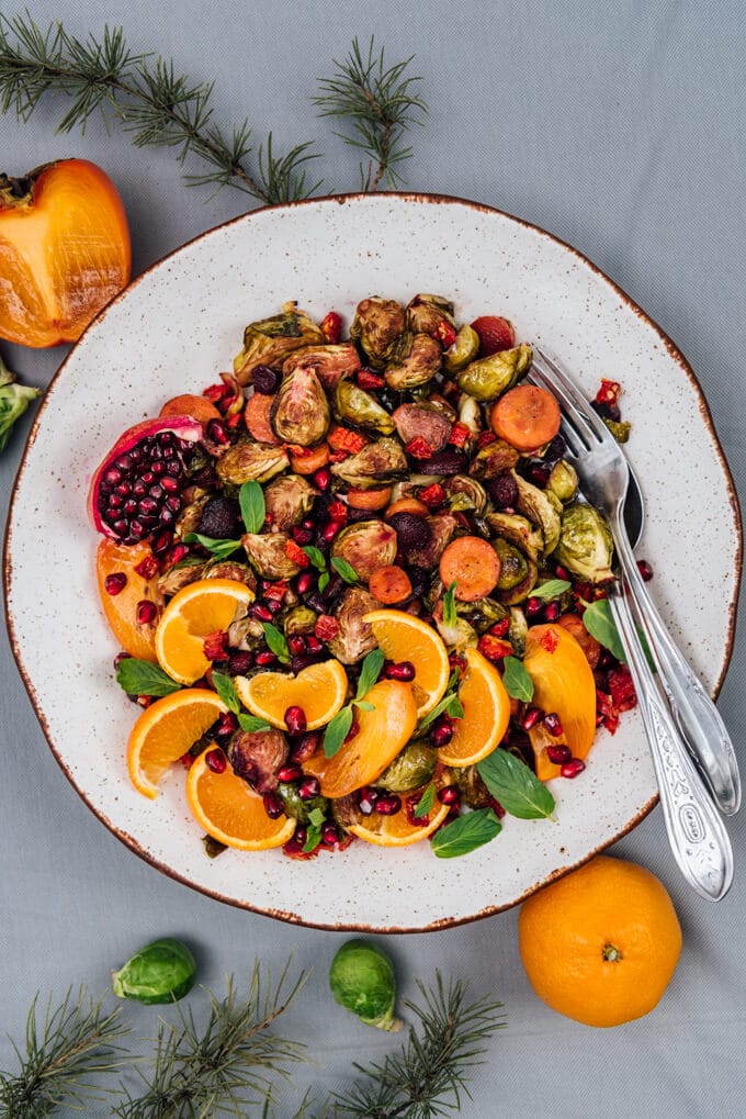 Balsamic roasted brussels sprouts salad in a white bowl.