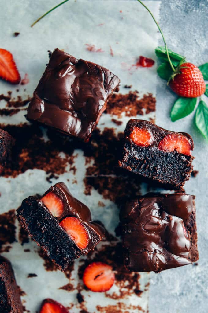 Chocolate strawberry brownies topped with a rich chocolate sauce