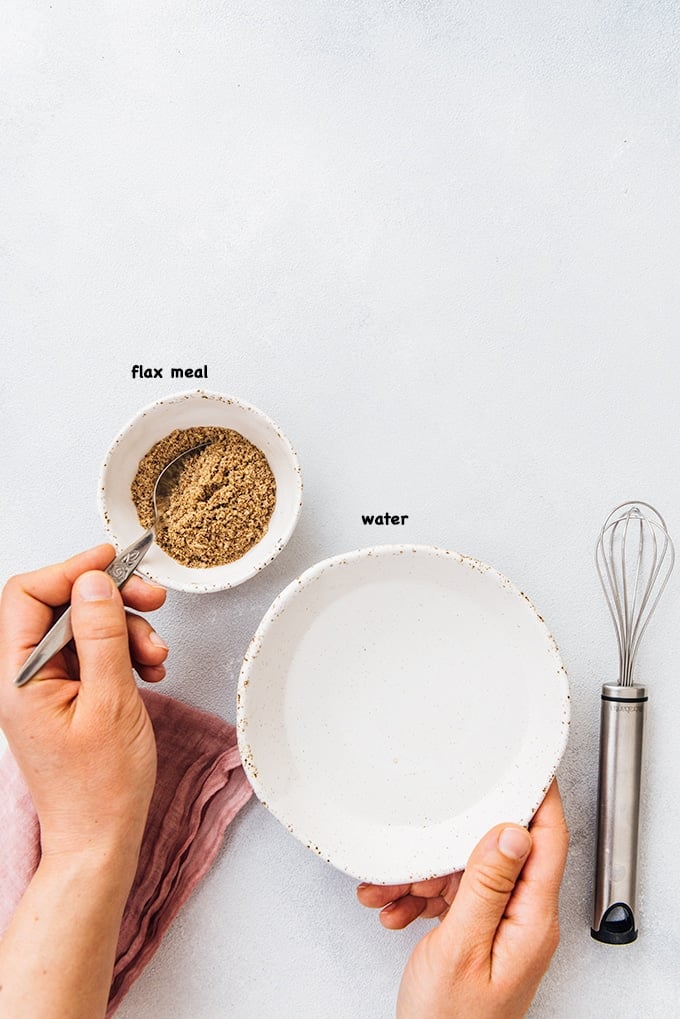 Make your flax egg with two ingredients and use it in your vegan recipes. #veganbaking #veganegg #flaxegg Making flax egg with flaxseed meal and water