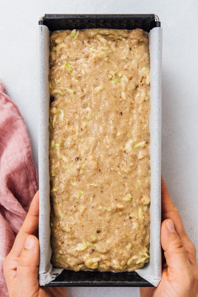 vegan zucchini walnut bread in a loaf pan
