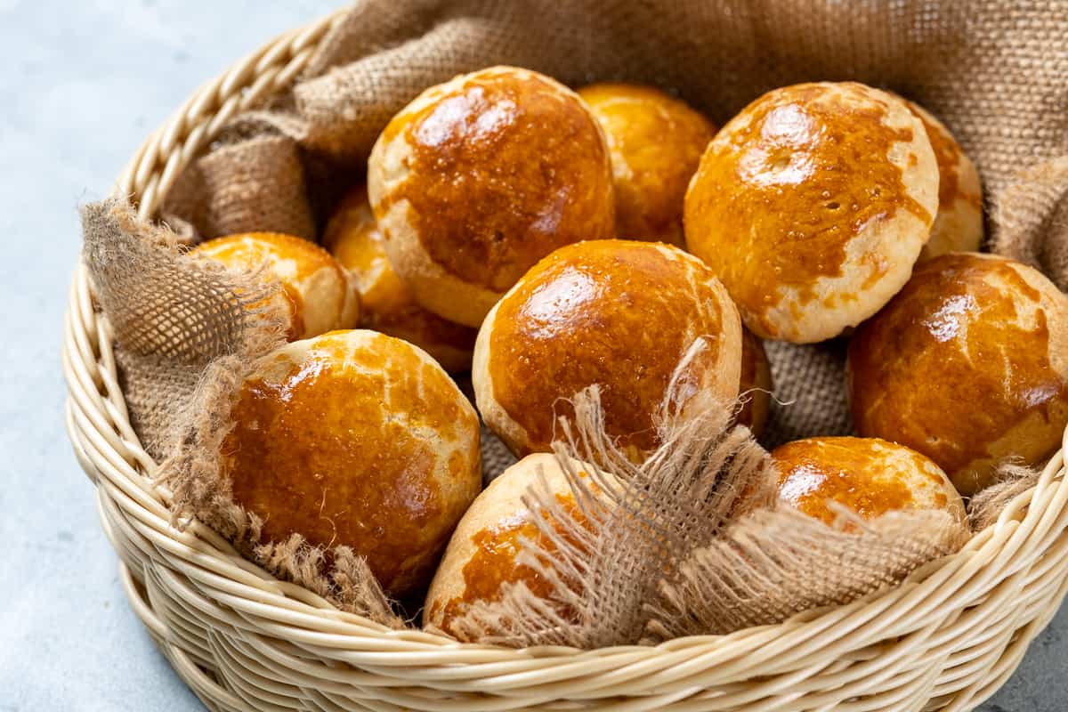 Close shot of dinner rolls in a basket.