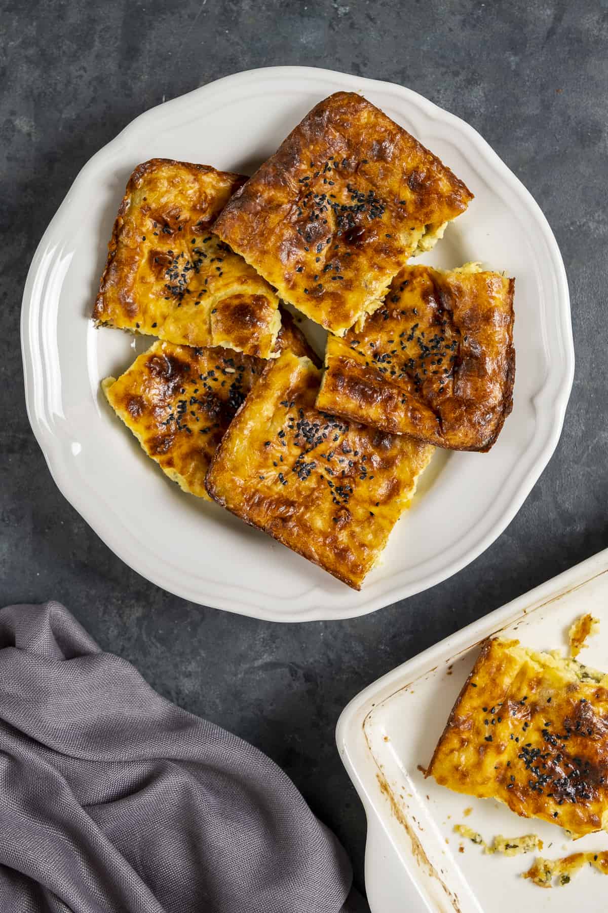 Borek slices on a white plate.