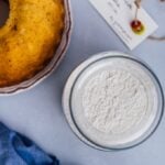 Homemade cake mix in a jar and a bundt cake on the side.