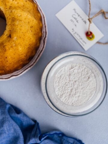 Homemade cake mix in a jar and a bundt cake on the side.