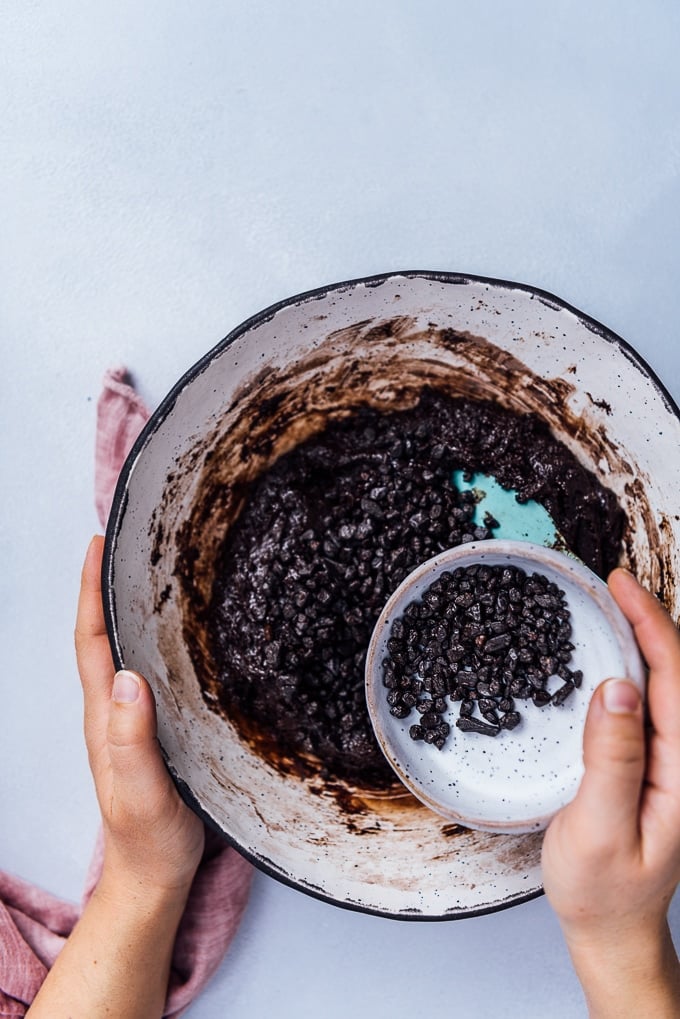 Adding chocolate chips in chocolate cookie dough