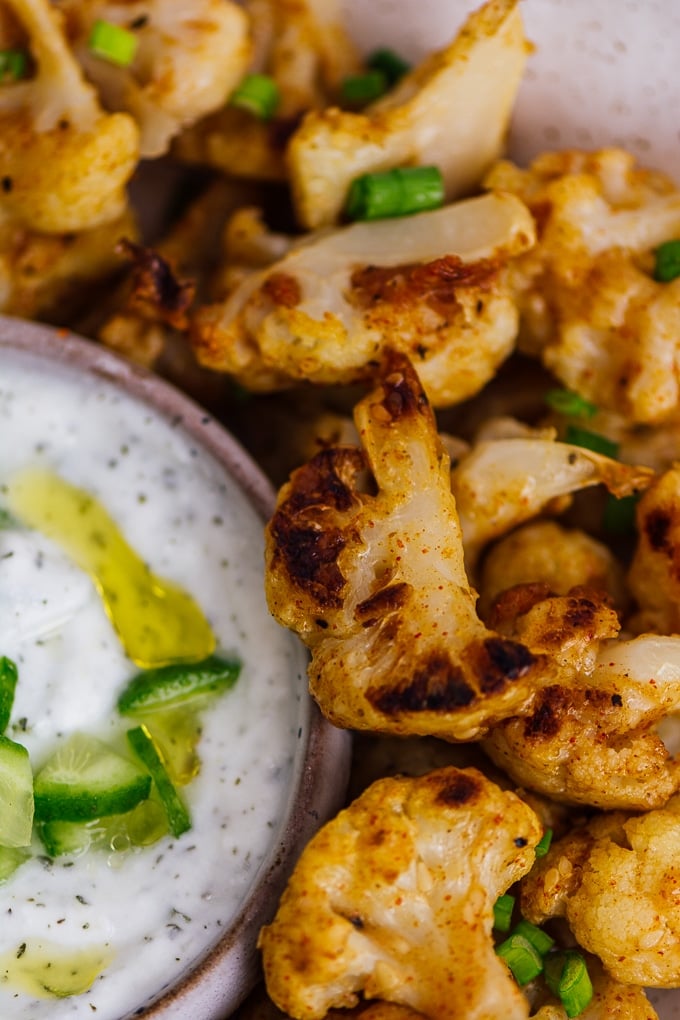 Baked cauliflower wings served with yogurt sauce