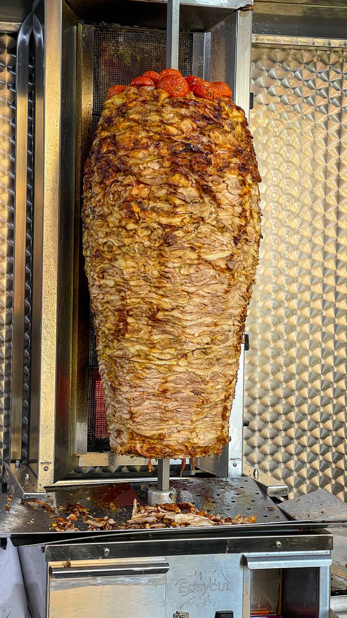 Chicken doner on a vertical spit.