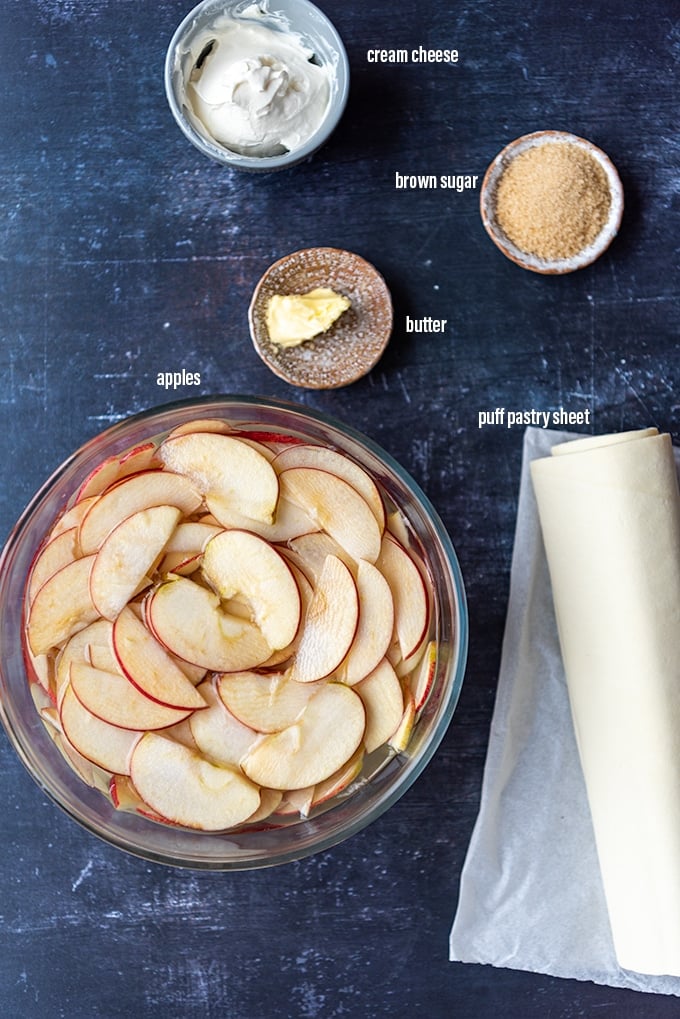 Apple roses recipe ingredients on a dark background