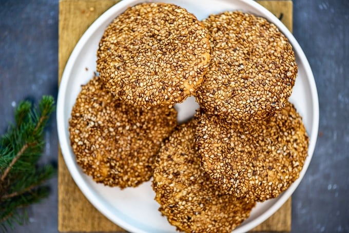 Turkish sesame cookies on a white plate.