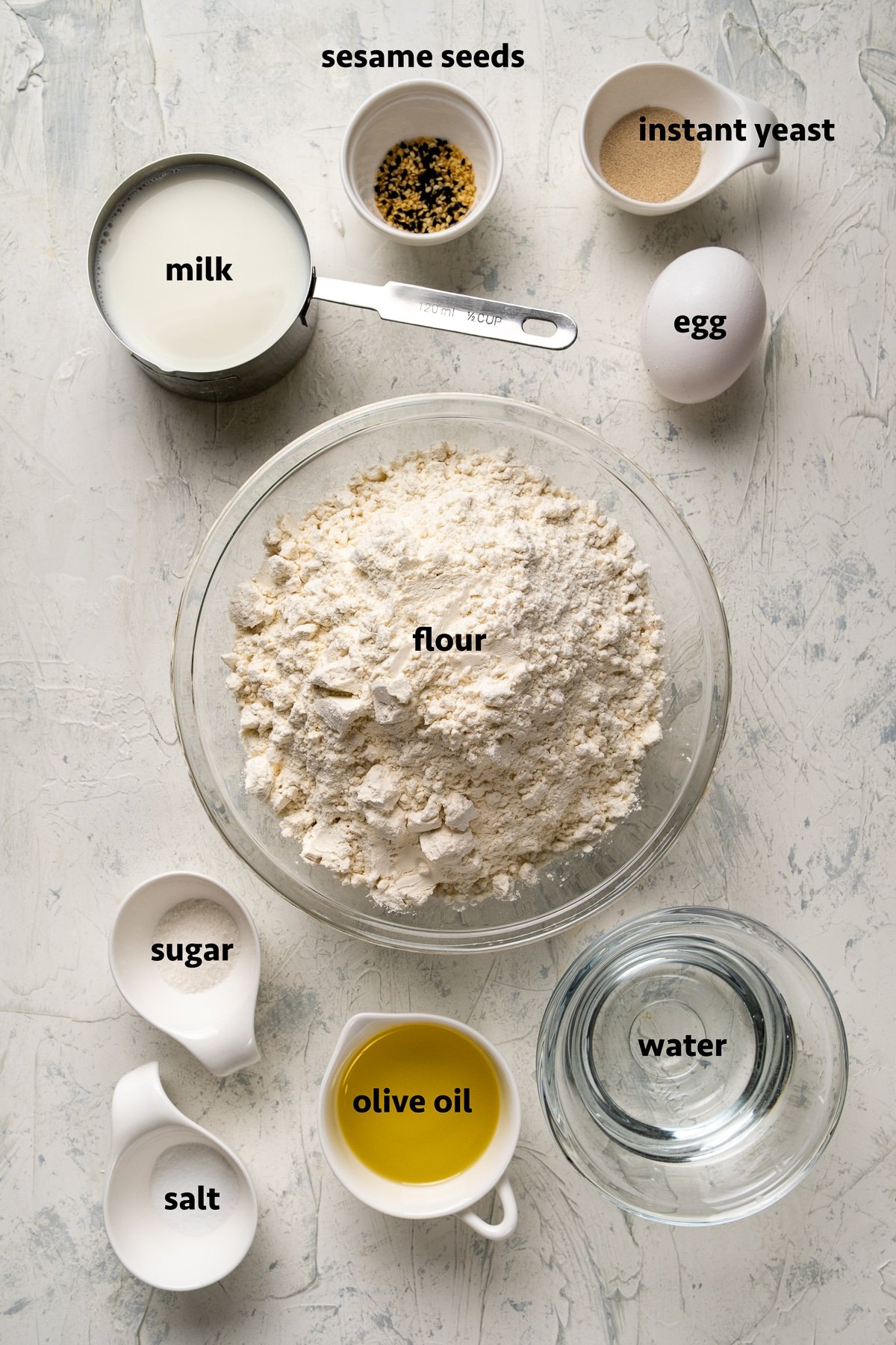 Ingredients for Turkish bread on a light background.