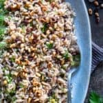 Pinterest pin featuring Turkish iç pilav, a rice dish with currants, pine nuts, and fresh herbs.