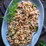 Pinterest pin featuring Turkish iç pilav, a rice dish with currants, pine nuts, and fresh herbs.