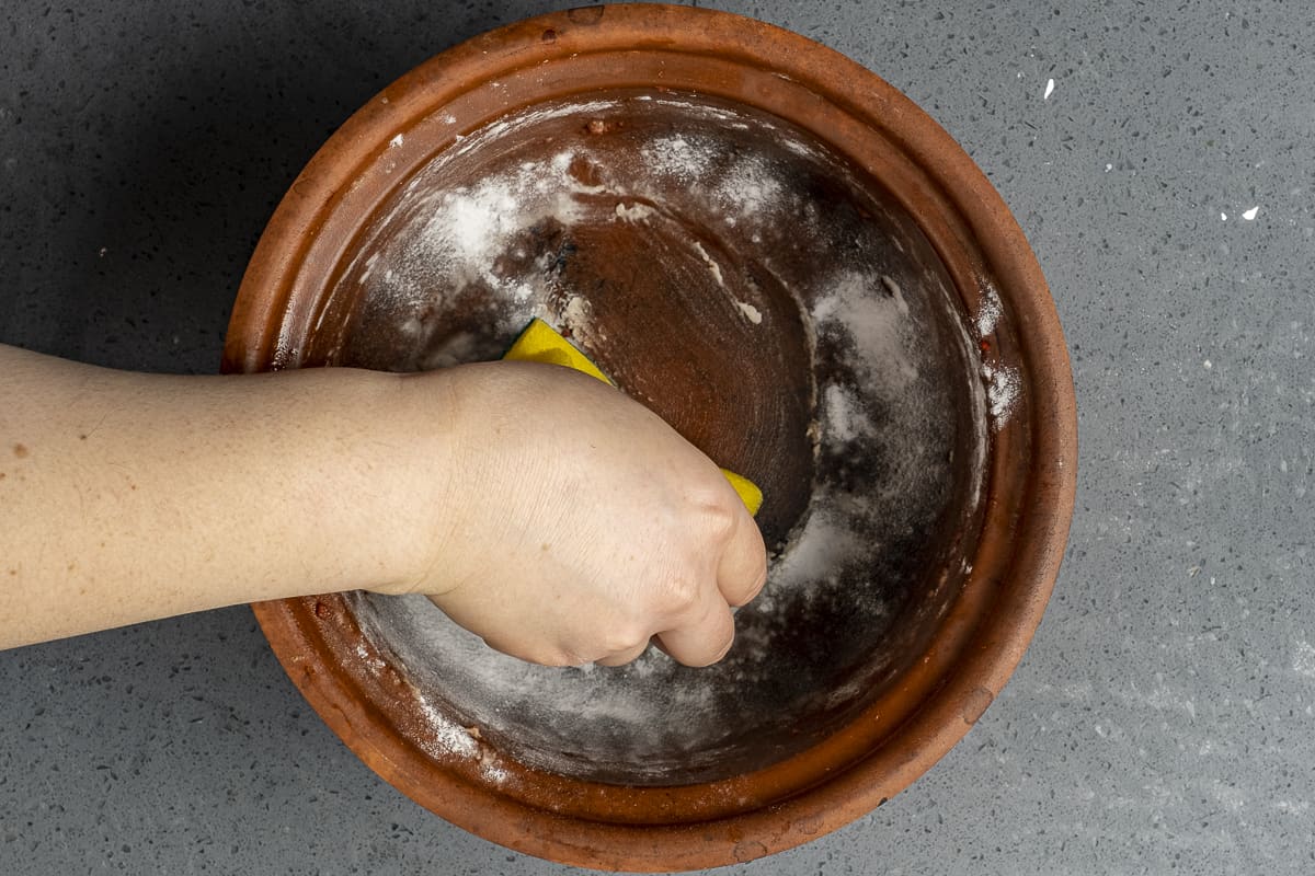 https://www.giverecipe.com/wp-content/uploads/2022/03/cleaning-clay-cookware.jpg