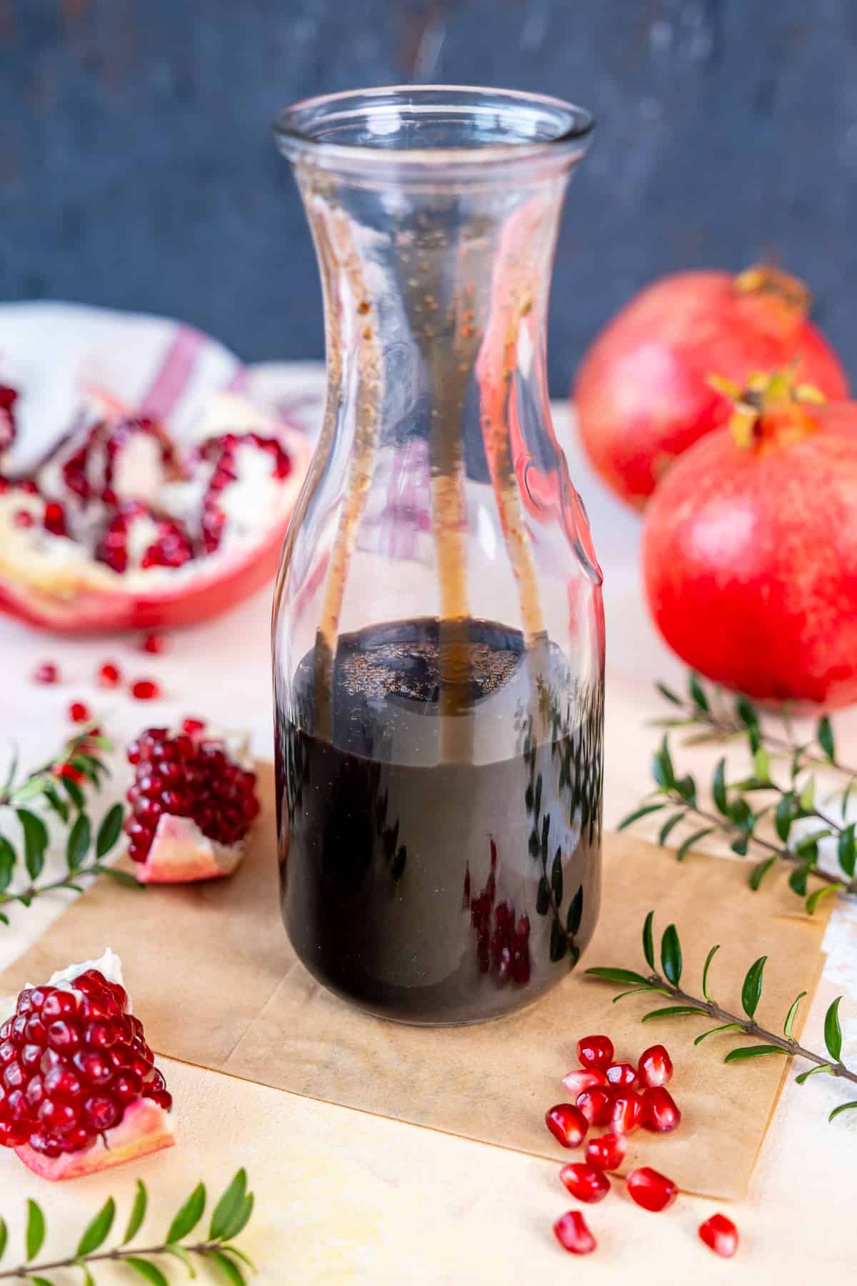 Pomegranate syrup in a bottle.