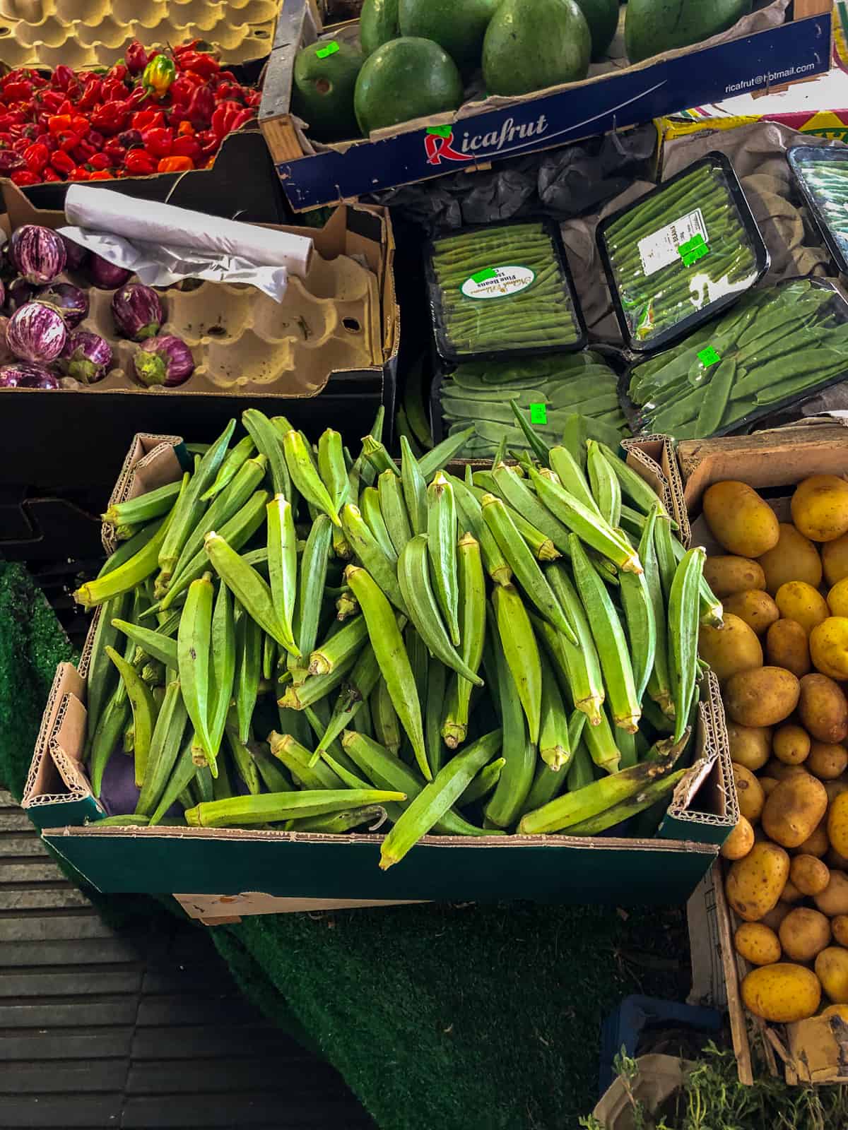 Fresh okra vegetable piled in a in the grocery store.