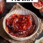 Bowl of homemade fig jam labeled Easy Fig Jam, with bread and fresh figs around.